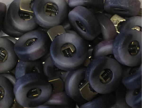 Kordelstopper toupe melliert 1-Loch