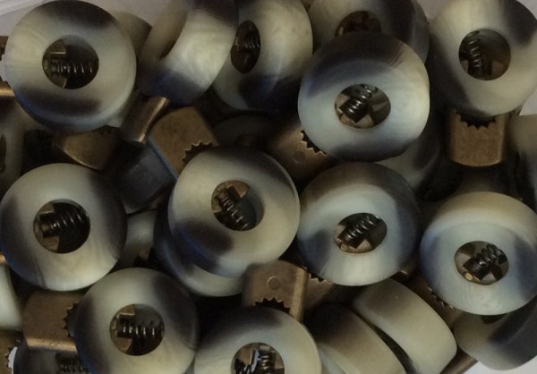 Kordelstopper braun beige 1-Loch