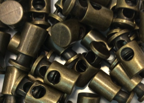 Kordelstopper alt messing 1-Loch